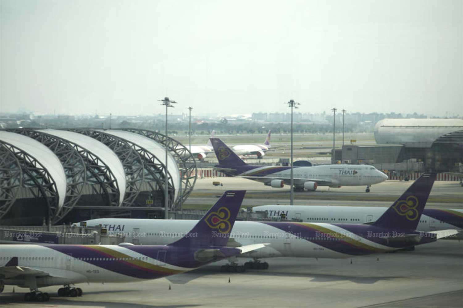 Thai Airways International plans parked at Suvarnabhumi airport. (File photo by Wichan Charoenkiatpakul)