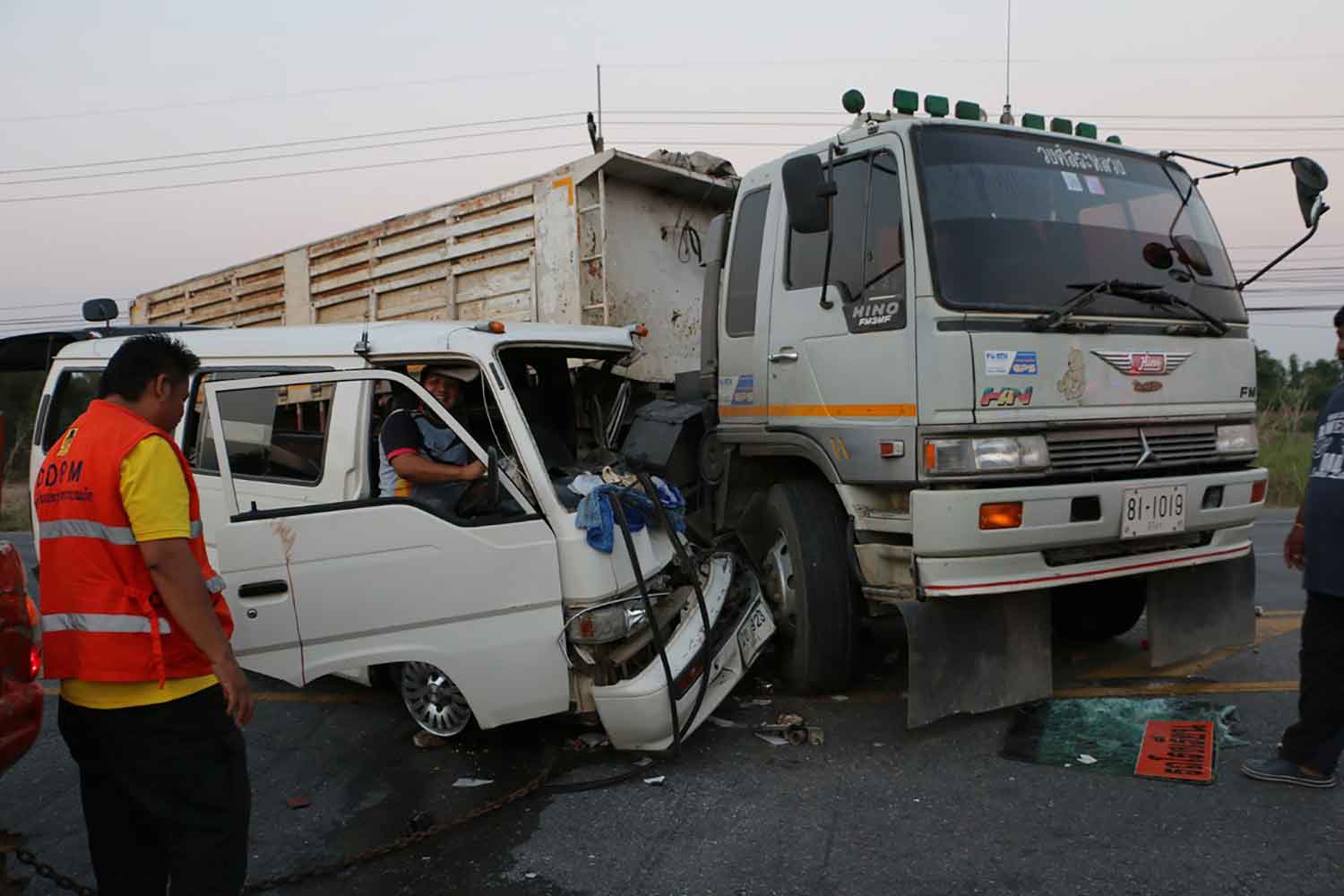 15 students injured when van, truck collide