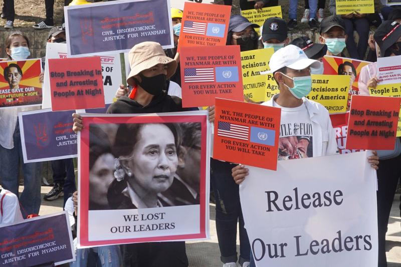 Protesters hold up signs with an image of detained Myanmar leader Aung Saan Suu Kyi and demanding her release during a demonstration against the military coup in front of the US embassy in Yangon on Tuesday. (AFP photo) Protesters hold up signs with an image of detained Myanmar leader Aung Saan Suu Kyi and demanding her release during a demonstration against the military coup in front of the US embassy in Yangon on Tuesday. (AFP photo)