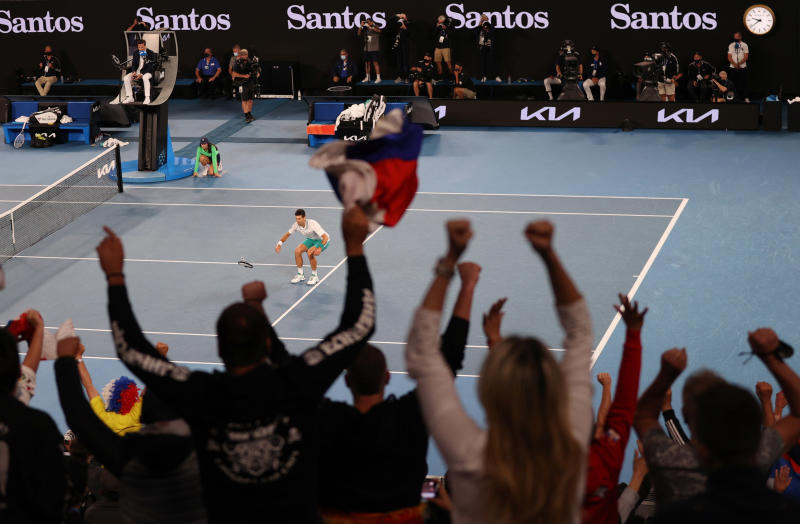Novak Djokovic celebrates winning his final match against Russia's Daniil Medvedev on Sunday. (Reuters photo) Novak Djokovic celebrates winning his final match against Russia's Daniil Medvedev on Sunday. (Reuters photo)
