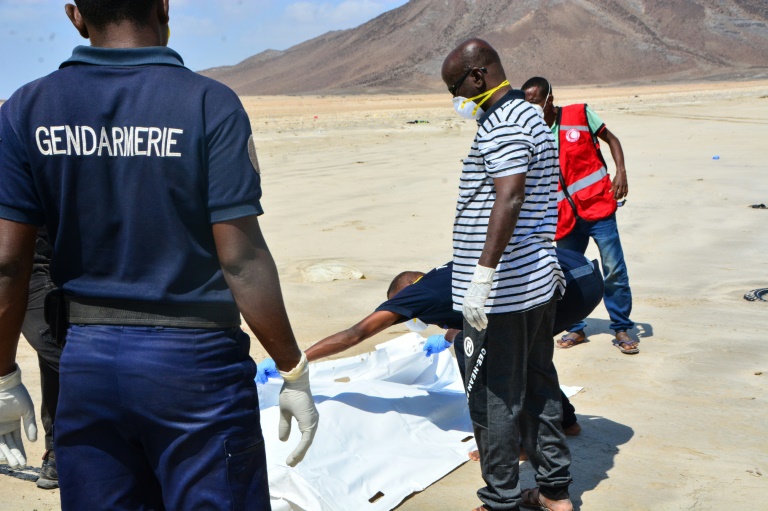 Djibouti has become a hub for migrants seeking to cross to Yemen and then seek work in the rich Gulf economies. Above: Police recover a body after two boats carrying migrants capsized in January 2019 Djibouti has become a hub for migrants seeking to cross to Yemen and then seek work in the rich Gulf economies. Above: Police recover a body after two boats carrying migrants capsized in January 2019