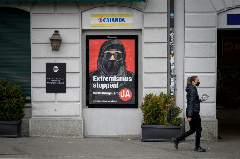 While the referendum proposal does not mention Islamic veils, it is clearly directed at the burqa While the referendum proposal does not mention Islamic veils, it is clearly directed at the burqa