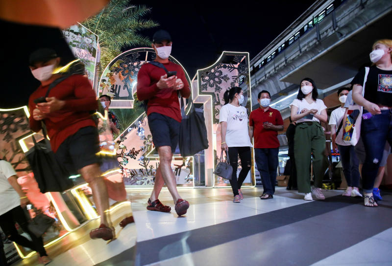 People visit the Terminal 21 shopping centre for shopping on Dec 31, 2020. (Reuters photo)