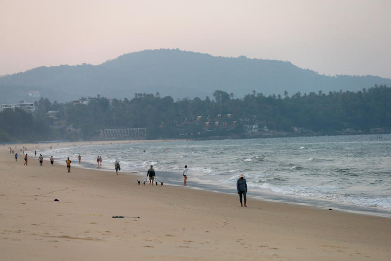 Phuket beaches have just a scattering of local people, instead of the hordes of tourists who normally pack the island at this time of year. (Photo: Reuters)