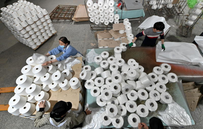 Global brands find it hard to untangle themselves from Xinjiang cotton - Vimarsana News