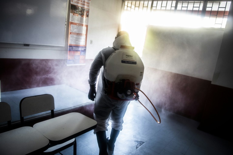 Workers are sanitizing 11,402 polling stations nationwide, which will be open for 12 hours of voting Workers are sanitizing 11,402 polling stations nationwide, which will be open for 12 hours of voting