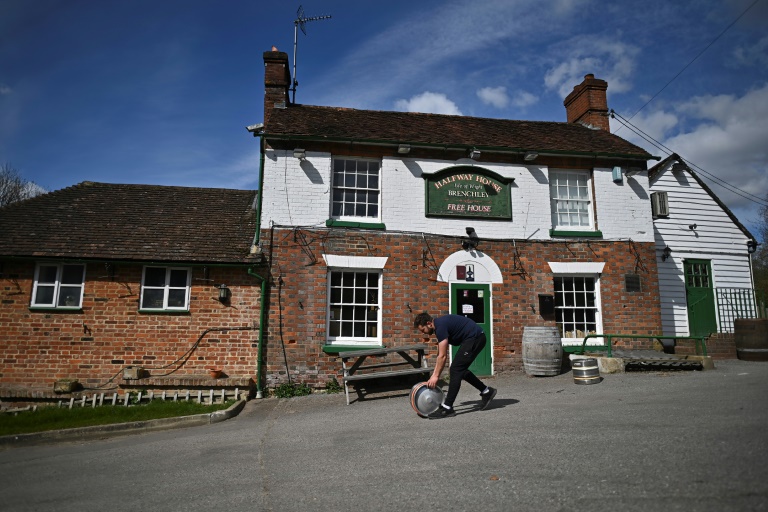 English pubs to reopen, India battles record surge: virus world update