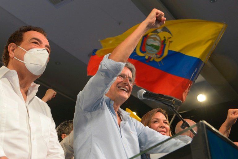 Former banker Guillermo Lasso (R) won Ecuador's presidential election after a campaign dominated by an economic crisis aggravated by the Covid-19 pandemic Former banker Guillermo Lasso (R) won Ecuador's presidential election after a campaign dominated by an economic crisis aggravated by the Covid-19 pandemic
