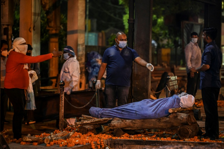 India is struggling with a deadly wave of Covid-19, and a new virus variant. India is struggling with a deadly wave of Covid-19, and a new virus variant.