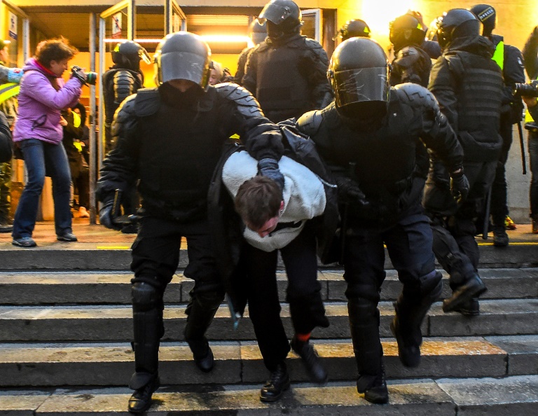 Police officers detain a protester during a rally in support of jailed Kremlin critic Alexei Navalny, in central Saint Petersburg Police officers detain a protester during a rally in support of jailed Kremlin critic Alexei Navalny, in central Saint Petersburg