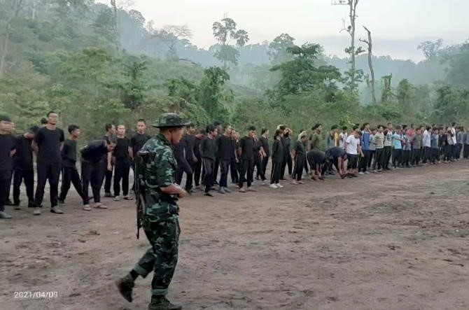 Myanmar protesters join militia members to attend a training led by Karen National Union (KNU), amid protests against the military coup, in Karen State, Myanmar April 9, 2021 in this still image obtained by Reuters from a video on April 26, 2021.