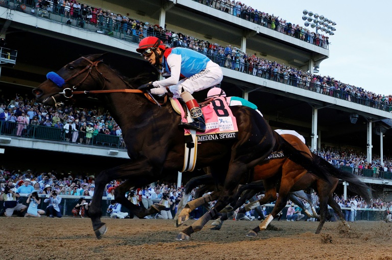 Medina Spirit, ridden by jockey John Velazquez, wins the 147th Kentucky Derby. Medina Spirit, ridden by jockey John Velazquez, wins the 147th Kentucky Derby.