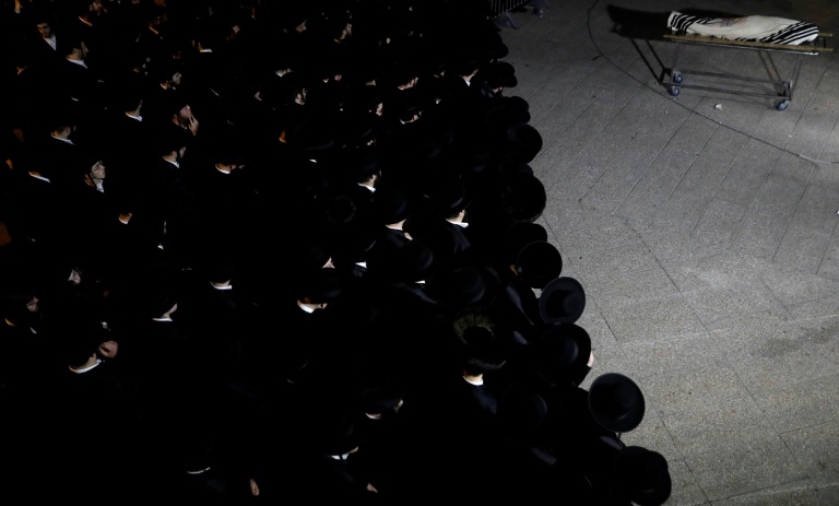 Following a pause for the Sabbath, Ultra-Orthodox Jews have been holding funerals for those killed in one of Israel's worst peacetime disasters. Following a pause for the Sabbath, Ultra-Orthodox Jews have been holding funerals for those killed in one of Israel's worst peacetime disasters.