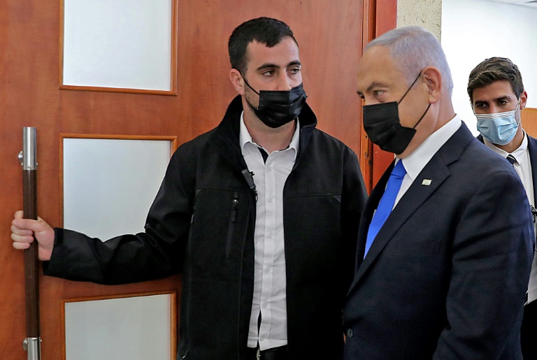 Israeli Prime Minister Benjamin Netanyahu, who is seen here leaving court last month after a hearing in his corruption tiral, faces a midnight deadline to form a government after an inconclusive March election. Israeli Prime Minister Benjamin Netanyahu, who is seen here leaving court last month after a hearing in his corruption tiral, faces a midnight deadline to form a government after an inconclusive March election.