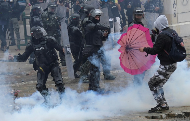 Demonstrators clash with police in Bogota, on April 28, 2021. Demonstrators clash with police in Bogota, on April 28, 2021.