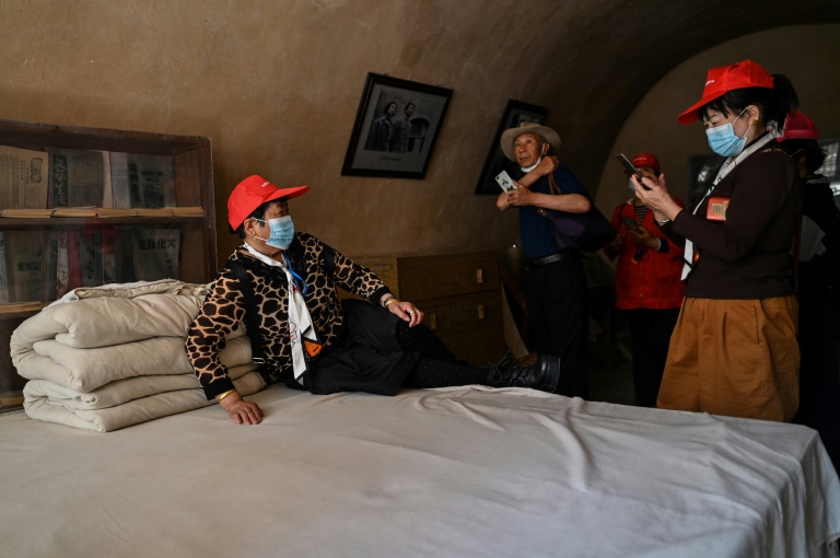 This picture taken during a government-organised media tour shows tourists at the former residence of Mao Zedong in Yan'an, the headquarters of the Chinese Communist Party from 1936 to 1947. This picture taken during a government-organised media tour shows tourists at the former residence of Mao Zedong in Yan'an, the headquarters of the Chinese Communist Party from 1936 to 1947.