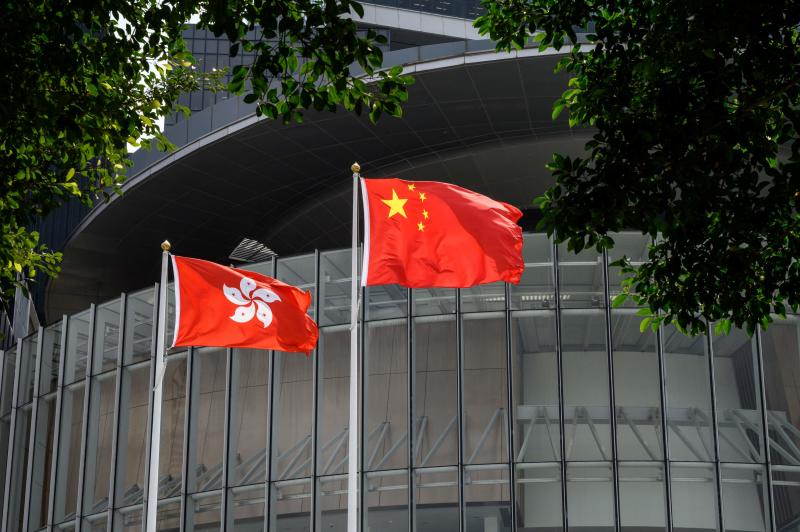 Flags of China Hong Kong flutter in the wind outside the Legislative Council complex in Hong Kong on March 30, 2021. (AFP file photo) Flags of China Hong Kong flutter in the wind outside the Legislative Council complex in Hong Kong on March 30, 2021. (AFP file photo)