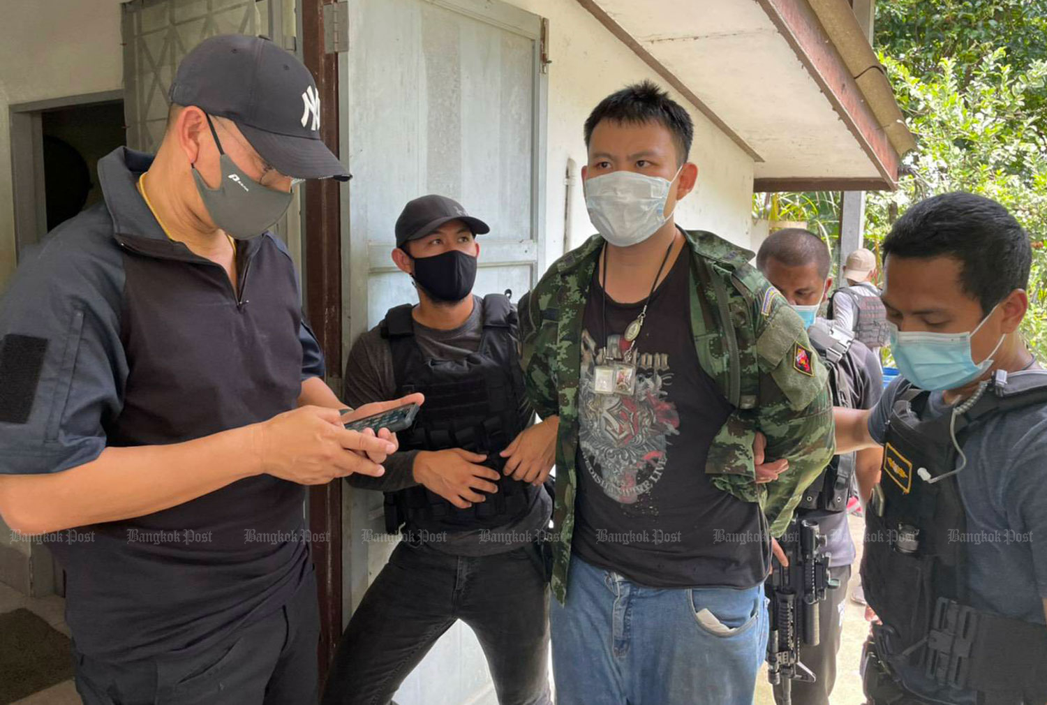 Kawin Saengnilkul, 23, surrenders to police in Ranong early Thursday afternoon. (Photo supplied)