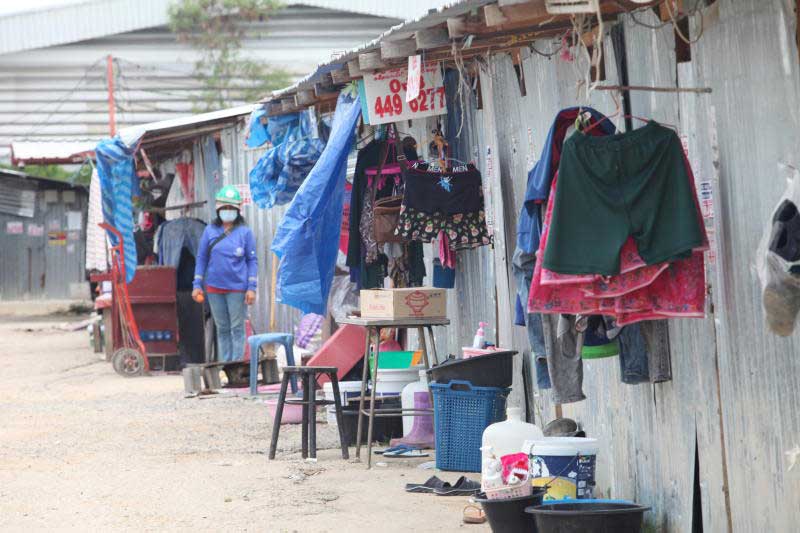 A worker is seen at a camp in Lat Krabang district of Bangkok on June 22, 2012. (Photo by Apichart Jinakul)