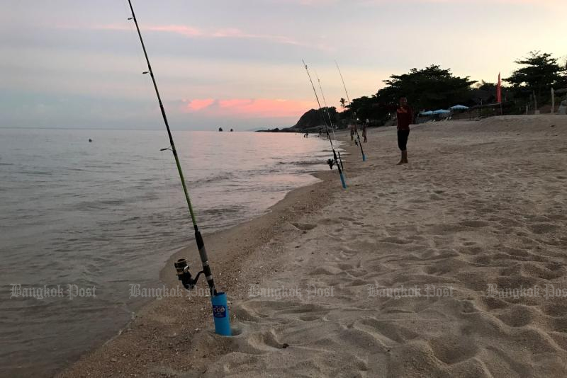 Fishermen are the only people on Lamai Beach on Koh Samui, Surat Thani province on July 3, 2021. (Photo: Dave Kendall)