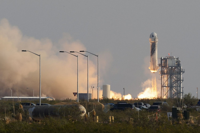 Jeff Bezos blast off on rocket in flight to space