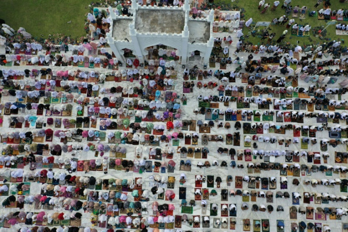 Indonesians gather to pray for Eid al-Adha despite virus surge