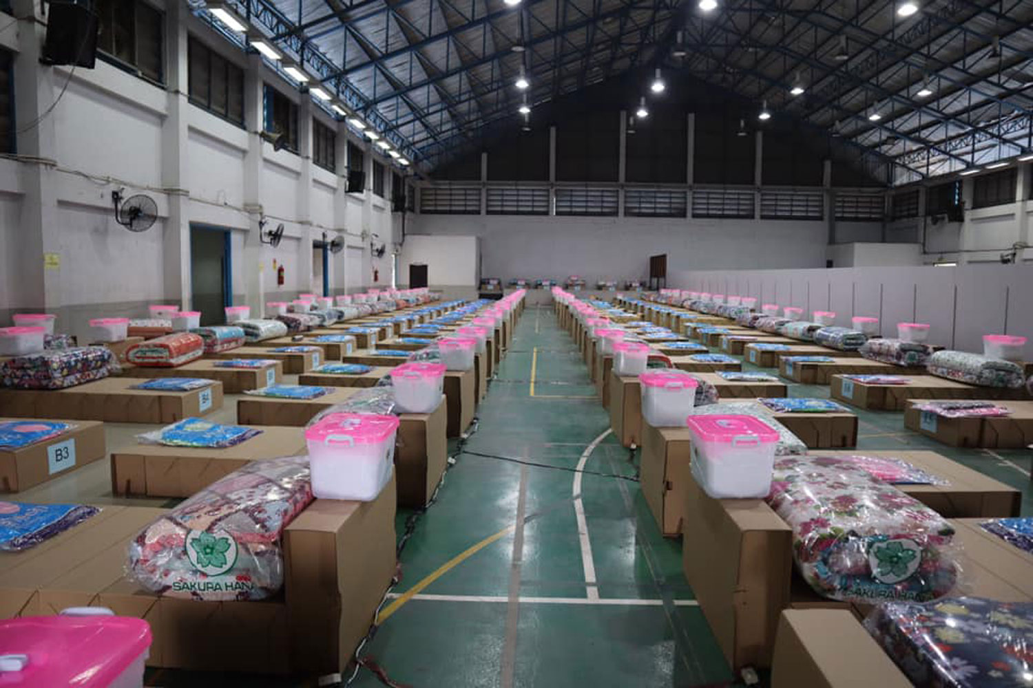 A community isolation centre with 200 beds has been set up in the compound of tambon Nadee municipality in Muang district, Samut Sakhon. Around 190 patients will be transferred to the centre on Saturday. (Photo: Samut Sakhon public relations Facebook page)