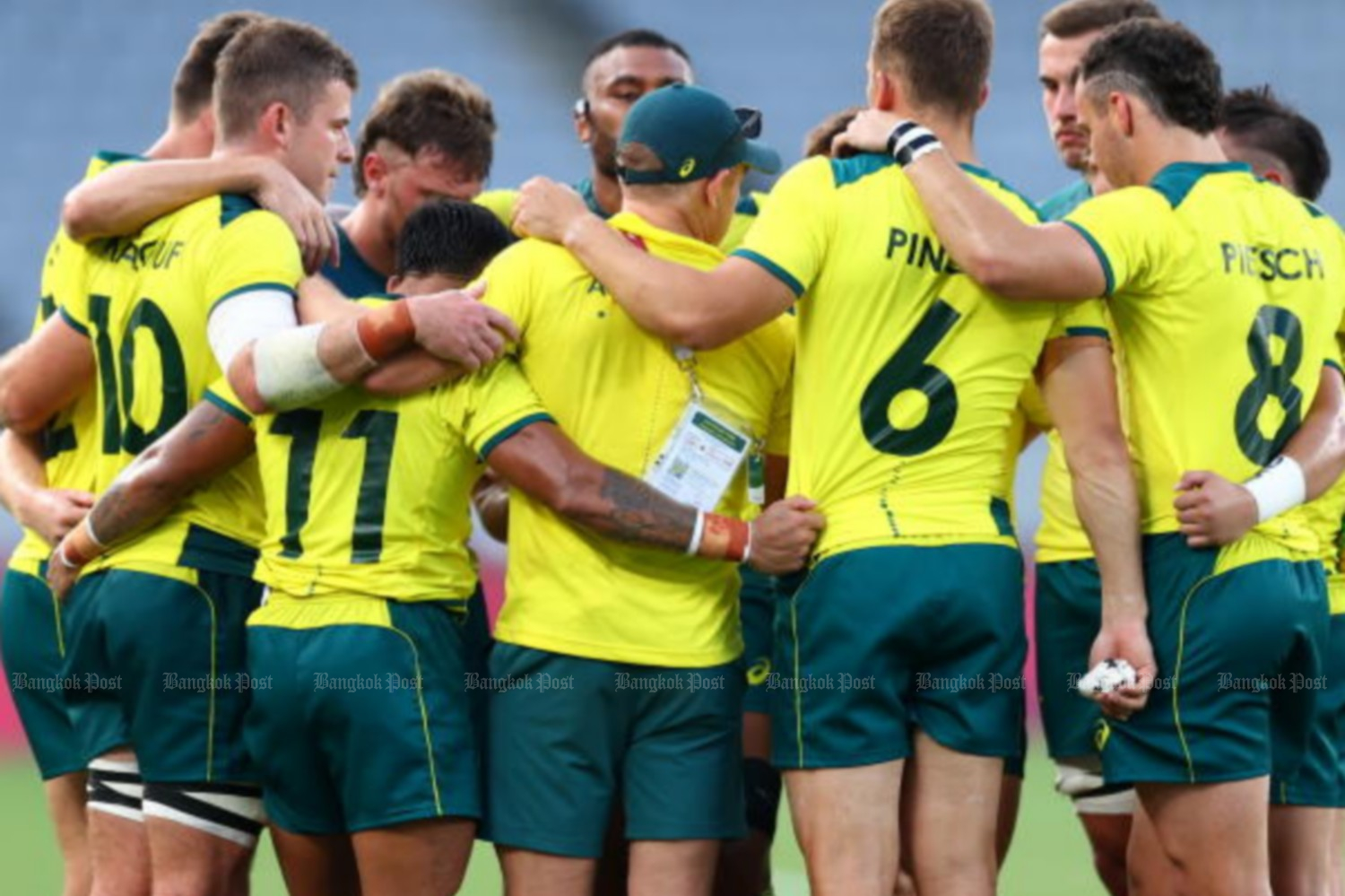 Australian men's rugby sevens players react after their win over Canada in Tokyo on July 28. (Photo: Reuters)