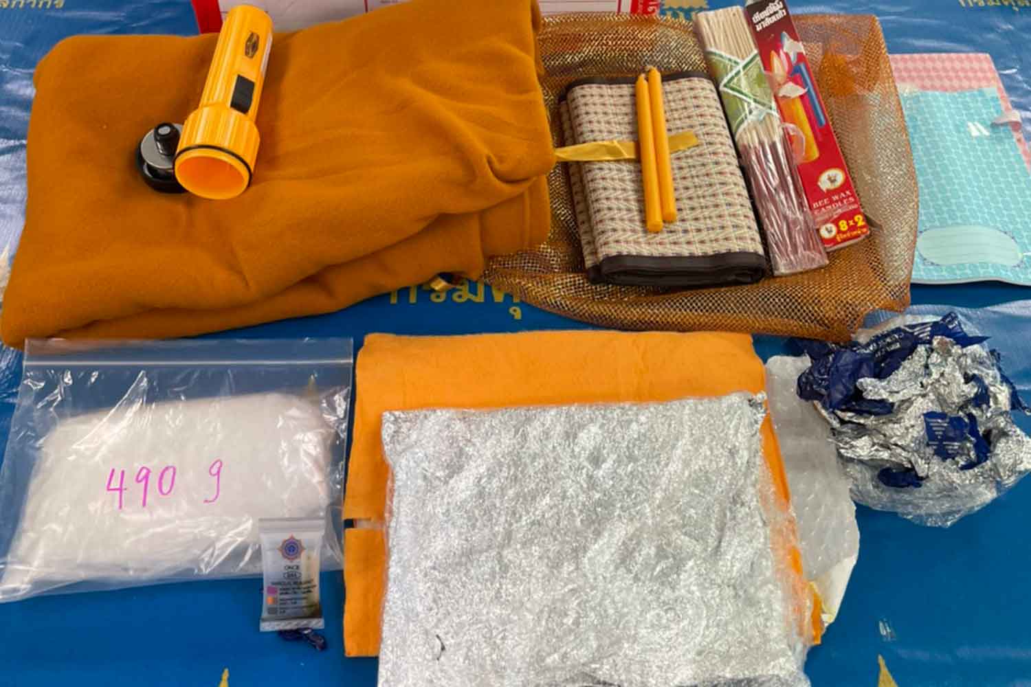 The Office of Narcotics Control Board shows the seized packs of crystal methamphetamine hidden unprecedentedly in a monk's pillow and a package of pain-killing patches. (Photo supplied)