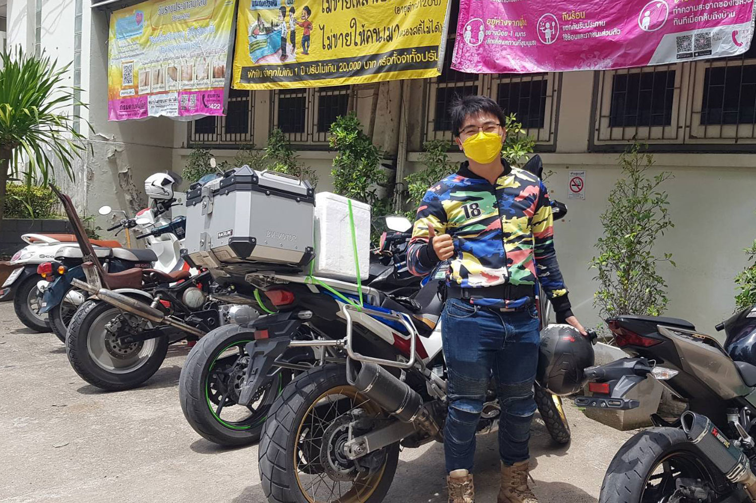 'Super riders' delivering home-isolation kits to Covid patients in Bangkok