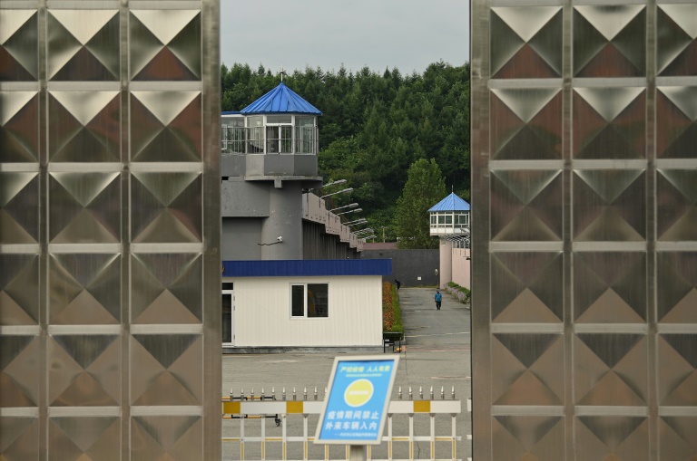 A man walks inside the detention center where Canadian businessman Michael Spavor is being held on spying charges in Dandong, China A man walks inside the detention center where Canadian businessman Michael Spavor is being held on spying charges in Dandong, China