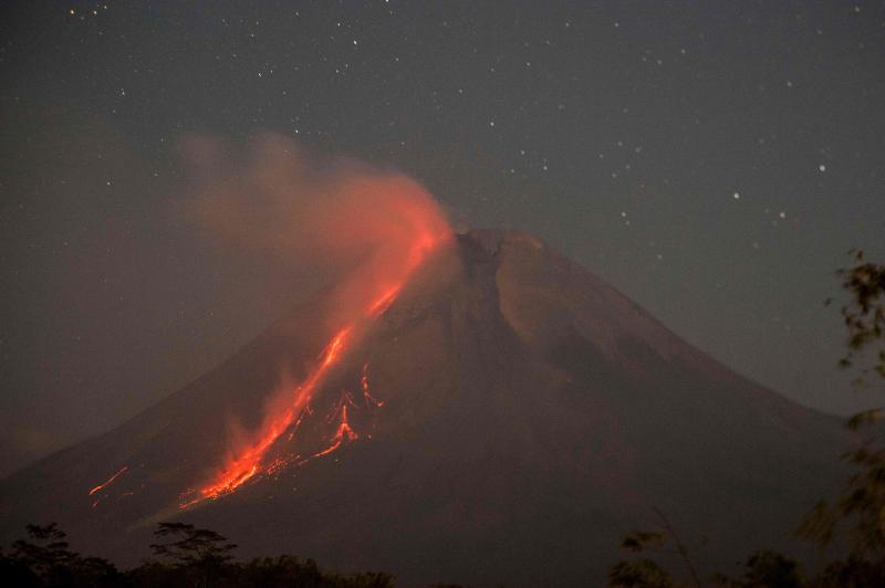 Indonesia volcano erupts, blankets villages in ash