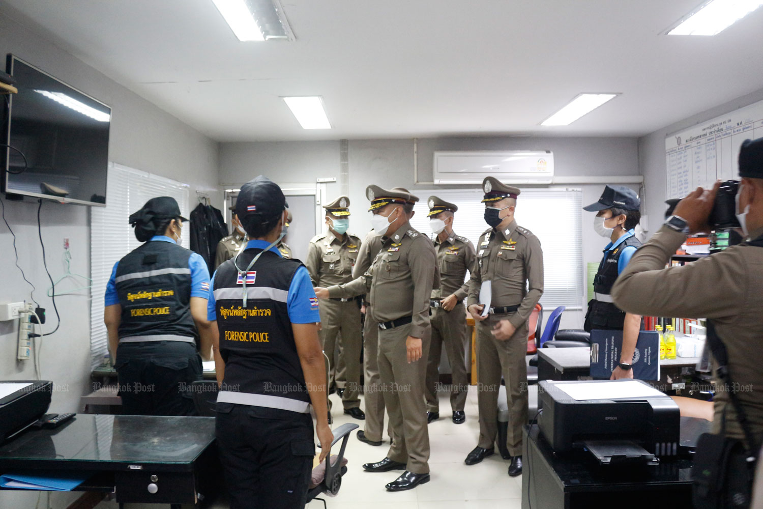 Police examine the interrogation room in Nakhon Sawan province where seven officers allegedly tortured and suffocated a drug suspect. (Photo: Chalit Phumruang)