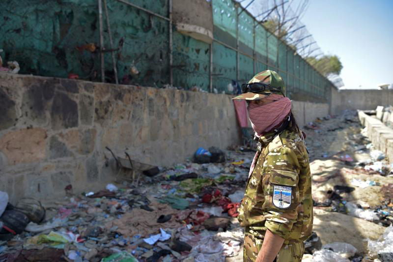 Islamic State suicide bombers kill at least 85 at Kabul airport