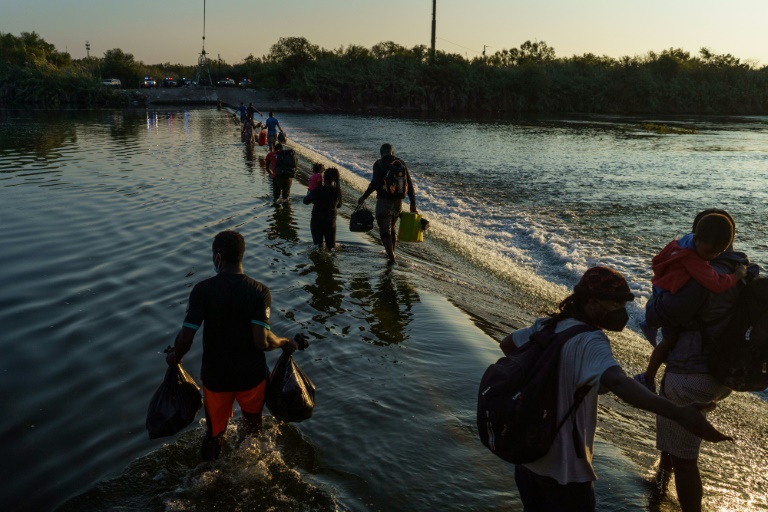 US to step up 'removal flights' for migrants stranded at Texas bridge