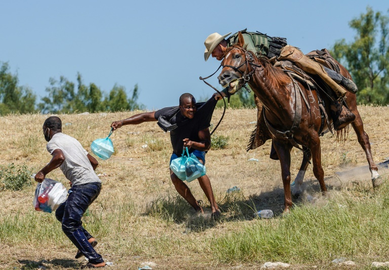 Uproar over mounted border agents turning back Haitian migrants