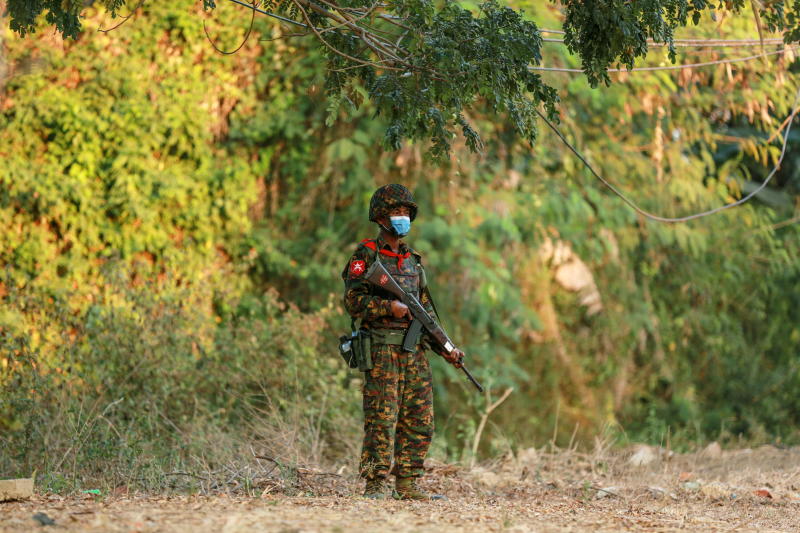 A Myanmar soldier stands guard near the congress compound in Nay Pyi Taw on Feb 2, 2021. (Reuters photo) A Myanmar soldier stands guard near the congress compound in Nay Pyi Taw on Feb 2, 2021. (Reuters photo)