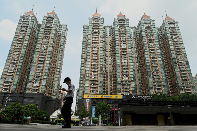 Chinese property developer Evergrande has admitted facing 'tremendous pressure' as it tackles a debt pile of more than $300 billion. Chinese property developer Evergrande has admitted facing 'tremendous pressure' as it tackles a debt pile of more than $300 billion.