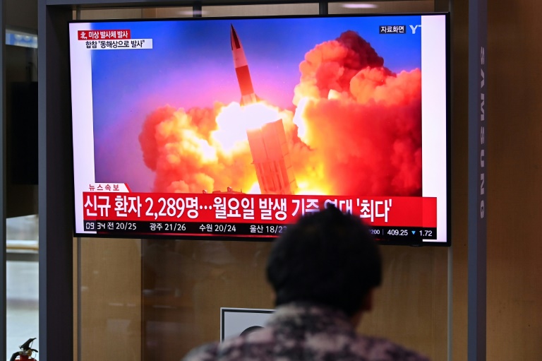 A television news broadcast shows file footage of a North Korean missile test, at a railway station in Seoul on Tuesday, after North Korea fired an A television news broadcast shows file footage of a North Korean missile test, at a railway station in Seoul on Tuesday, after North Korea fired an