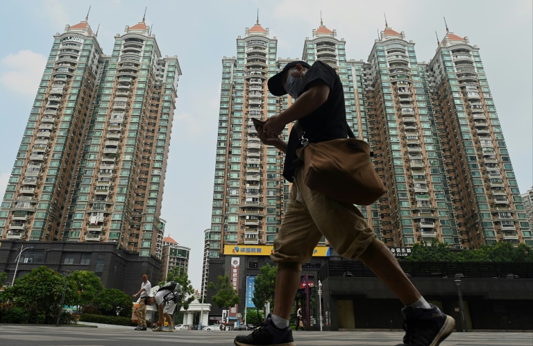 China urges banks to avoid housing speculation to curb Evergrande risk