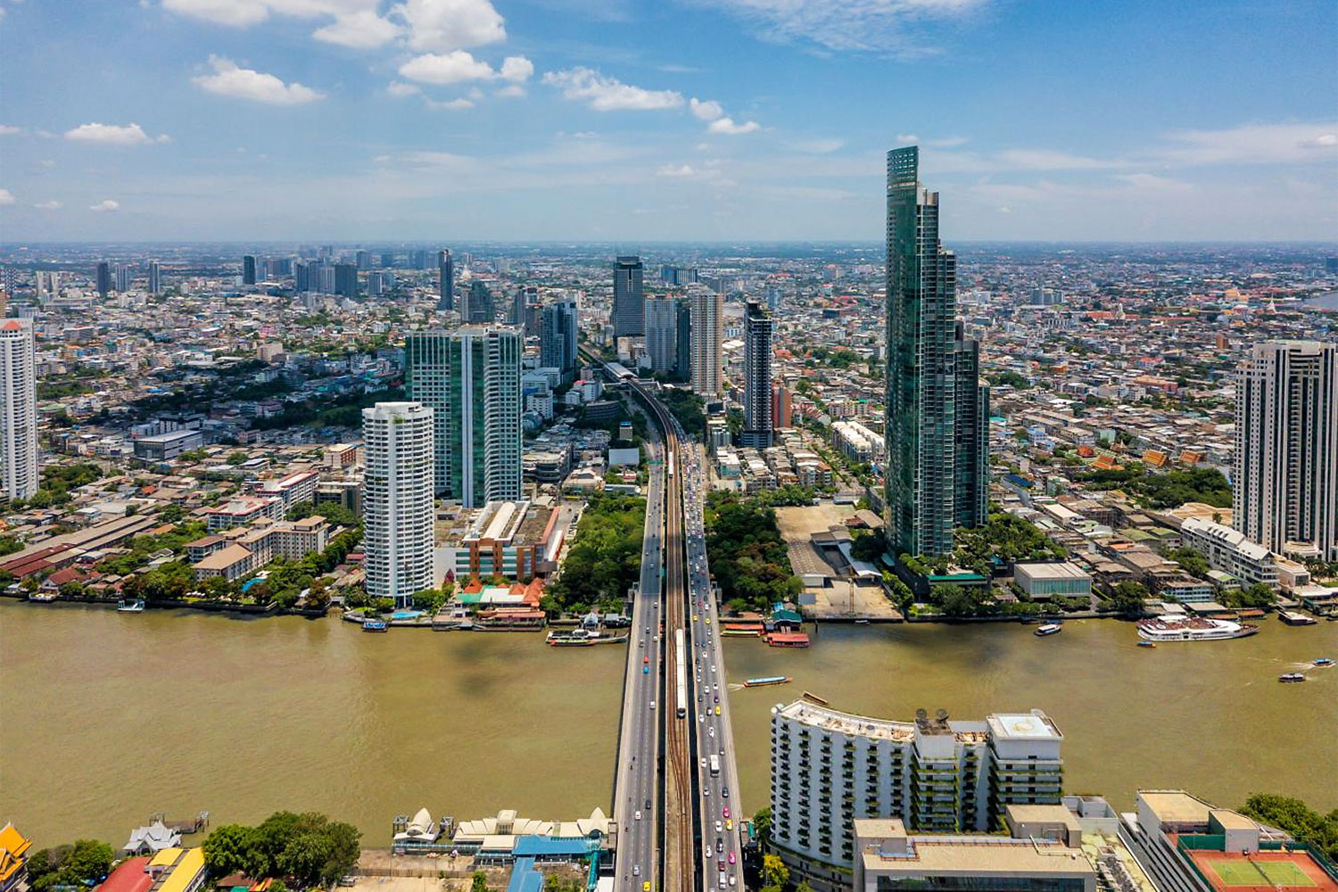 The Bangkok skyline as seen from above Saphan Taksin skytrain station.