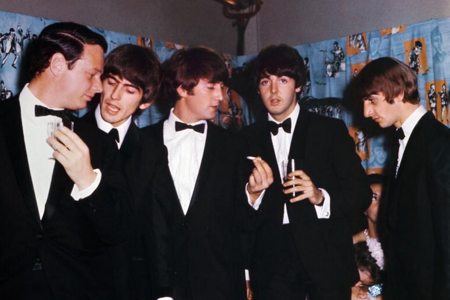 The Beatles - George Harrison, John Lennon, Paul McCartney and Ringo Starr - with manager Brian Epstein, left, at the premiere of The Beatles - George Harrison, John Lennon, Paul McCartney and Ringo Starr - with manager Brian Epstein, left, at the premiere of