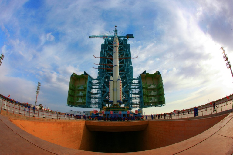 A Long March-2F carrier rocket, carrying the Shenzhou-13 spacecraft that was launched by China on October 16, 2021, was transported days earlier to the launching area at the Jiuquan Satellite Launch Centre in the northwestern Gansu province A Long March-2F carrier rocket, carrying the Shenzhou-13 spacecraft that was launched by China on October 16, 2021, was transported days earlier to the launching area at the Jiuquan Satellite Launch Centre in the northwestern Gansu province