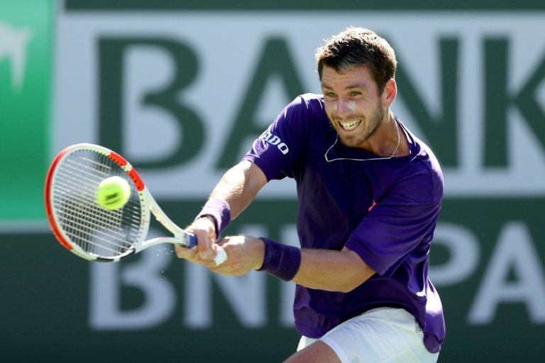 Great Britain's Cameron Norrie returns a shot against Grigor Dimitrov of Bulgaria during the semi-finals ATP Indian Wells Masters in the California desert Great Britain's Cameron Norrie returns a shot against Grigor Dimitrov of Bulgaria during the semi-finals ATP Indian Wells Masters in the California desert