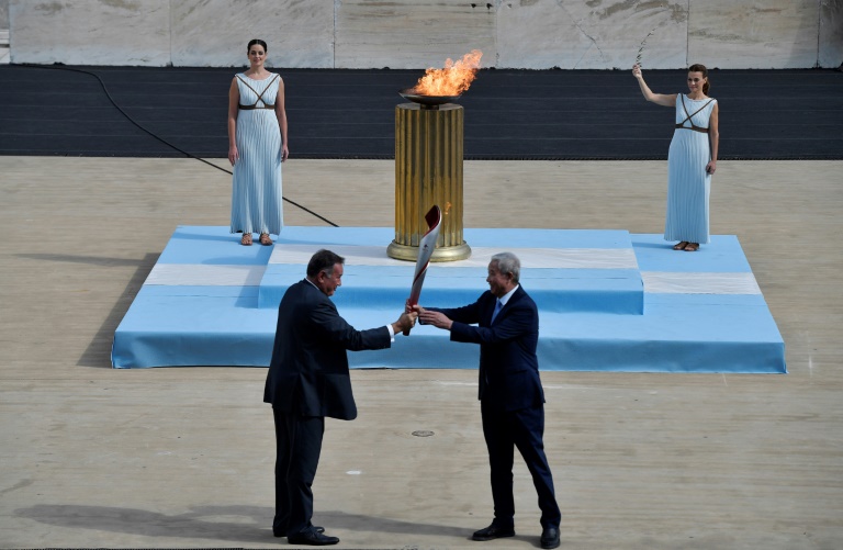 Bangkok Post - Greece hands over Olympic flame to Beijing 2022 hosts