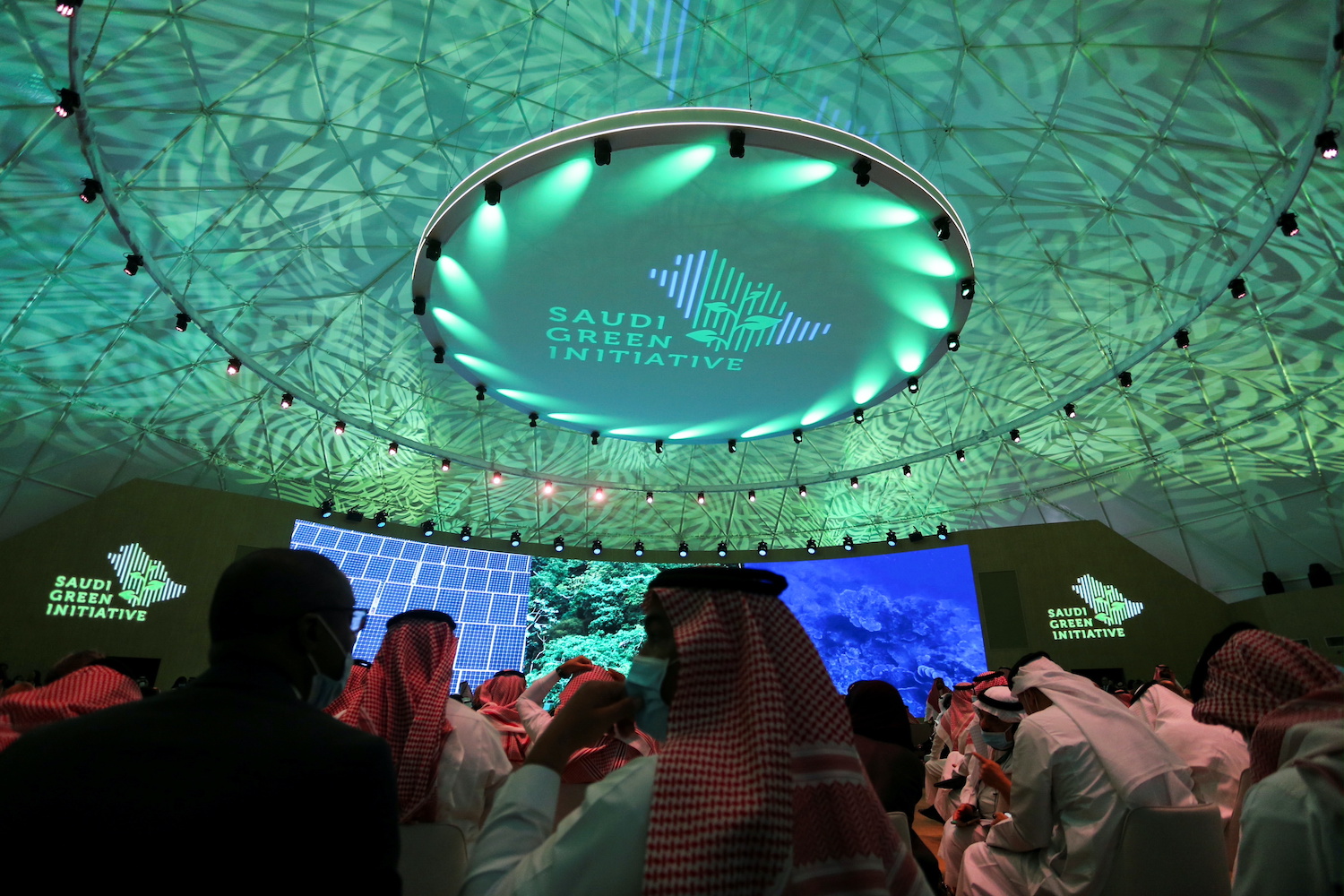 Participants attend the Saudi Green Initiative Forum to discuss efforts by the world’s top oil exporter to tackle climate change, in Riyadh on Saturday. (Reuters Photo)