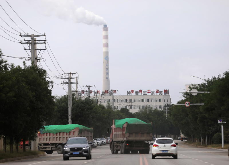 A chimney of a China Energy coal-fired power plant is pictured in Shenyang, Liaoning province, China, on Sept 29, 2021. (Reuters photo)