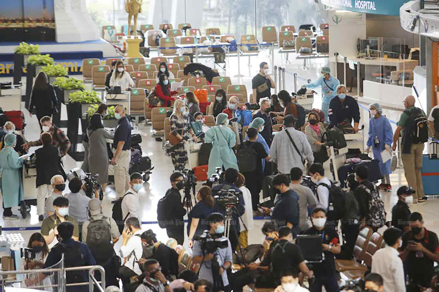 Suvarnabhumi airport returns to life on Monday as the first tourists begin arriving, marking the reopen of Thailand to foreign visitors. (Photo: Wichan Charoenkiatpakul)