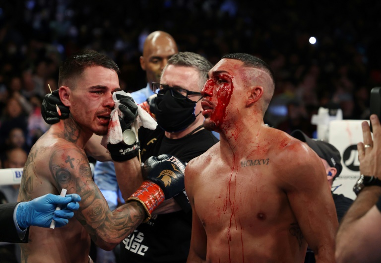Teofimo Lopez (right) and George Kambosos talk after their championship bout Teofimo Lopez (right) and George Kambosos talk after their championship bout