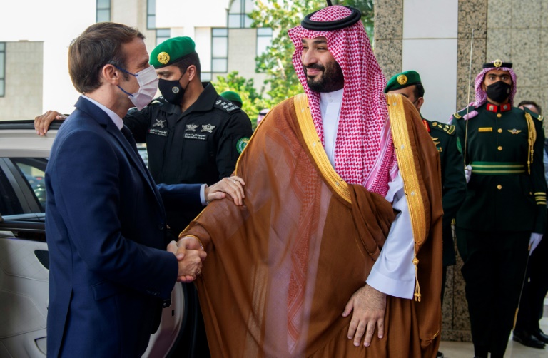 Saudi Crown Prince Mohammed bin Salman (R) greets French President Emmanuel Macron (L) in Saudi Arabia's Red Sea coastal city of Jeddah on December 4, 2021 Saudi Crown Prince Mohammed bin Salman (R) greets French President Emmanuel Macron (L) in Saudi Arabia's Red Sea coastal city of Jeddah on December 4, 2021